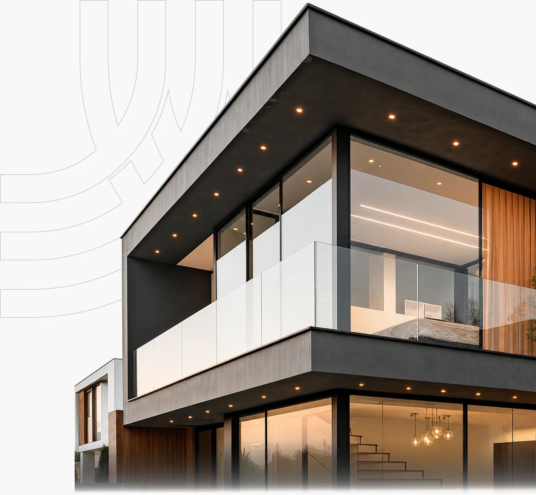 A modern apartment building with glass balconies and warm interior lighting